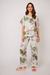 Pantalons imprimé de fleurs tropicales Pistache