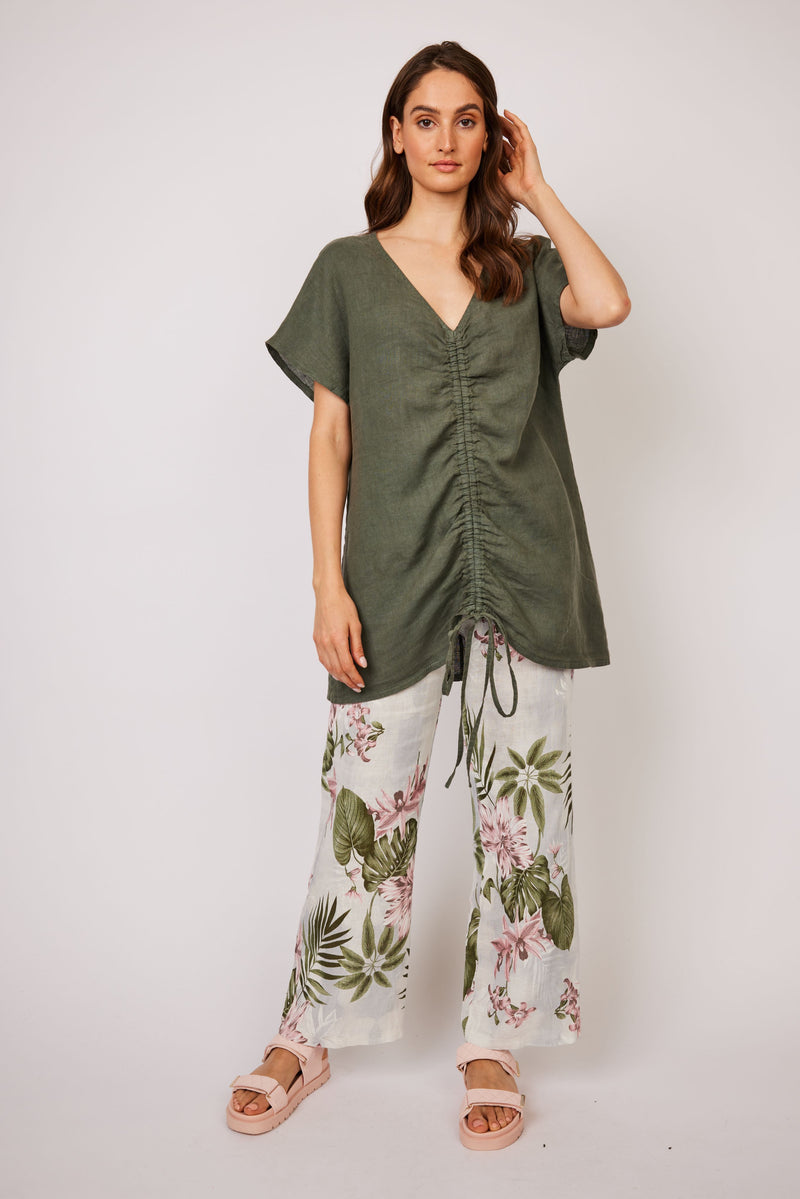 Pantalons imprimé de fleurs tropicales Pistache